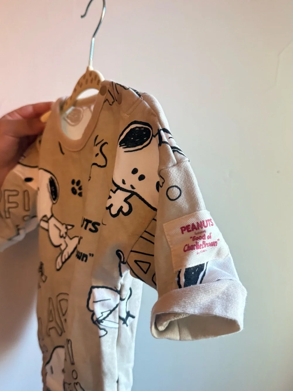 Peanuts Snoopy Cream Baby Onesie with Black Graphics